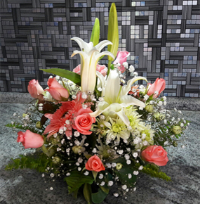 Bella Queen Posy with pink roses, pink gerberas and a white lily